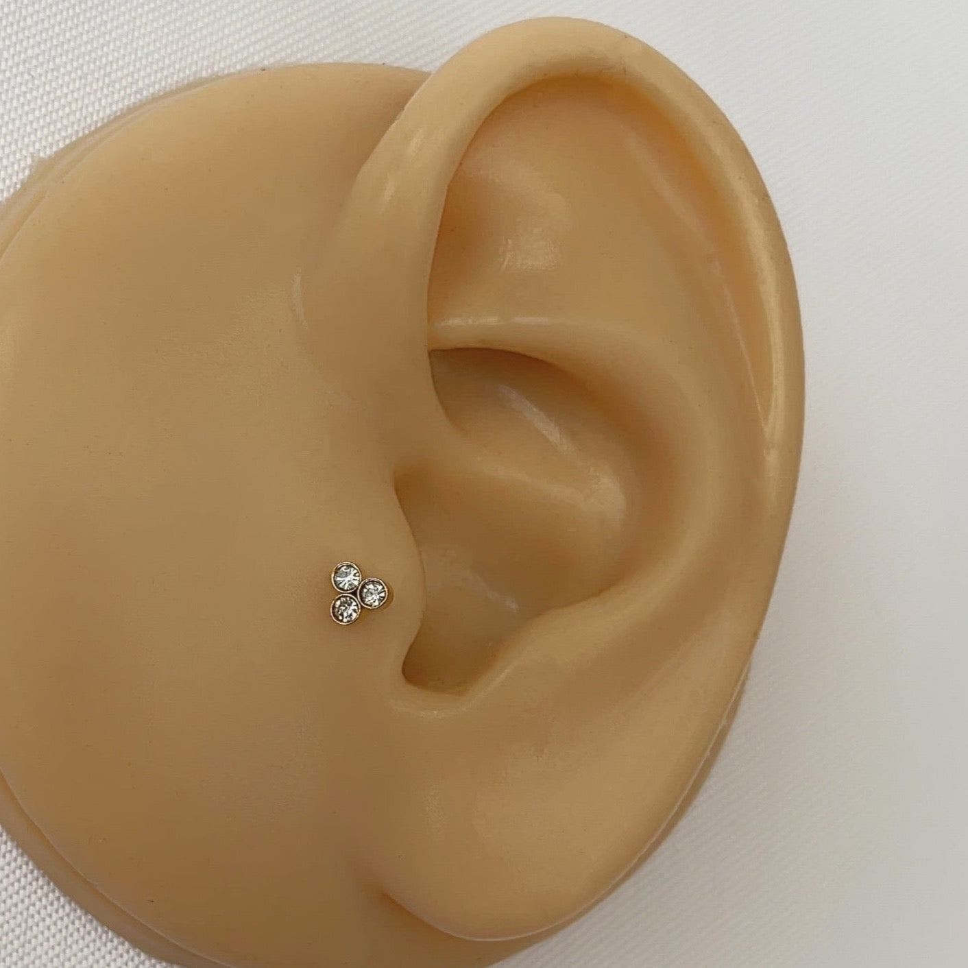 Triple Diamond Gold | Tragus Piercing