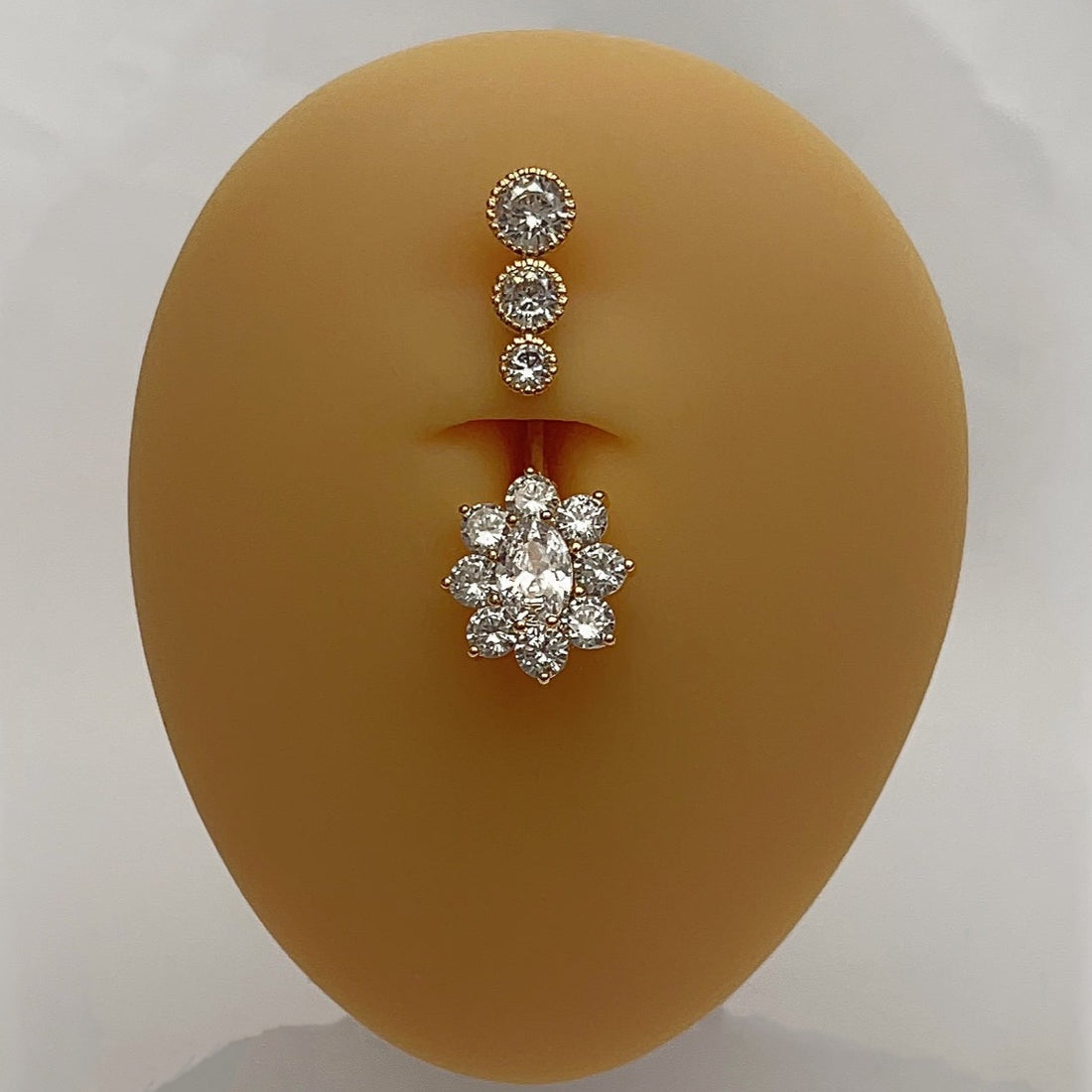 Dreifache Diamantblume | Bauchnabelpiercing